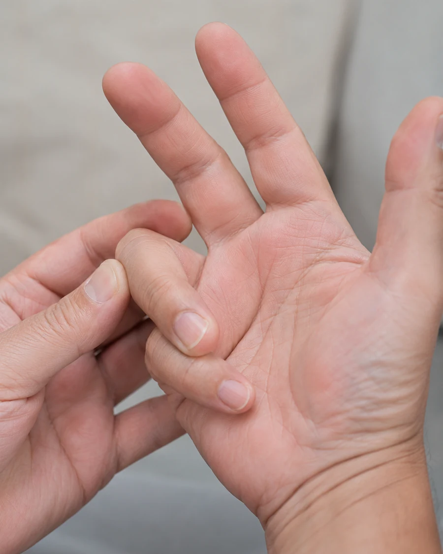 Close-up of a finger catching in flexion